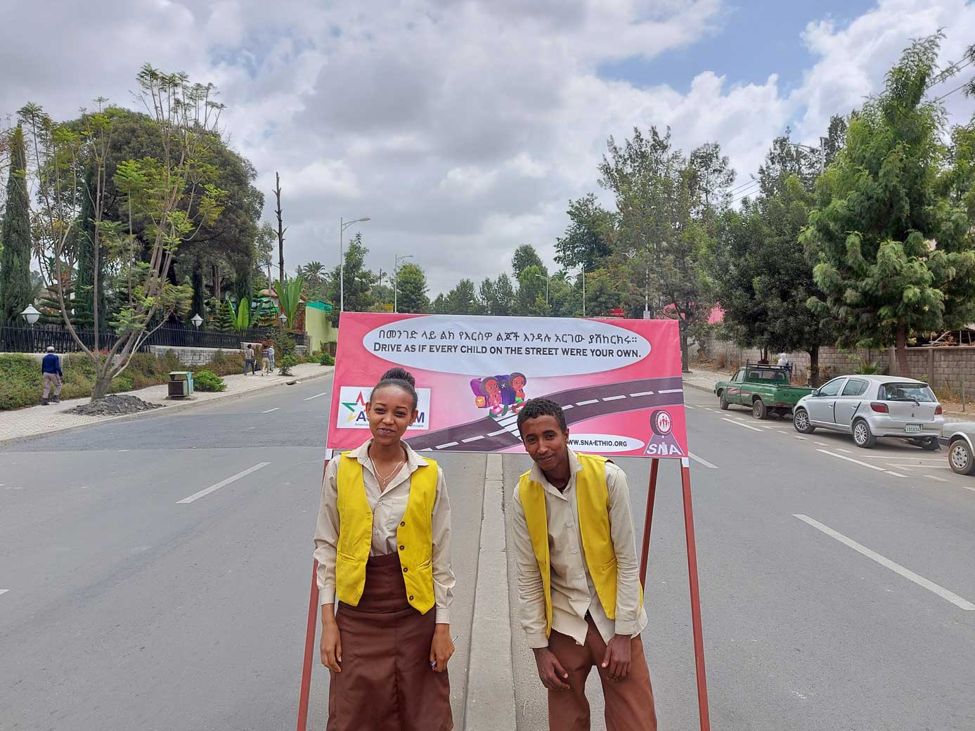 Traffic slogan billboards displayed outside a school